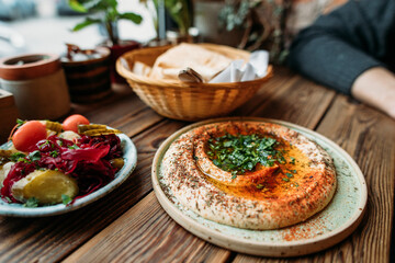 at cafe with hummus dishes