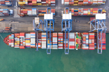 Container , container ship in export and import business and logistics. Shipping cargo to harbor by...