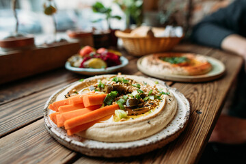 at cafe with hummus dishes