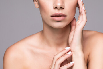 Fototapeta na wymiar Woman lips chin neck beautiful skin age care isolated on gray background