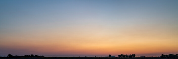 summer dawn in northern Colorado, panoramic web banner with a copy space