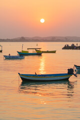 Fototapeta na wymiar boat at sunset