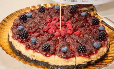 tart with raspberries, blueberries and blackberries