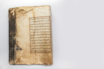 Aceh, Indonesia, 10/9/2020: The holy text of the Koran handwritten form Aceh, Indonesia. Pedir Museum ancient objects collection.