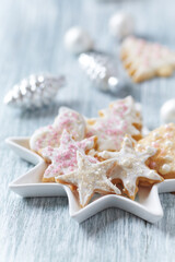 Homemade Christmas cookies on bright background.	