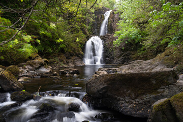 Falls of Rha on the Isle of Skye, Scotland. Beautiful collection of many smaller falls flowing in...