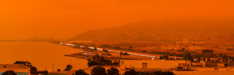 Orange haze over San Francisco on September 9 2020 from record wildfires in Californa, ash and...