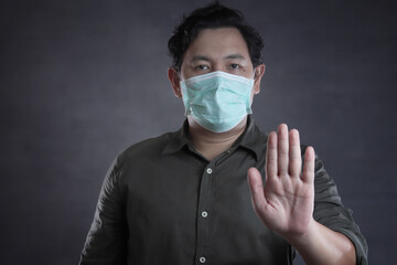 Man wearing mask to prevent coronavirus covid 19 pandemic
