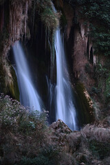 Fototapeta na wymiar waterfall in the forest long exposure 