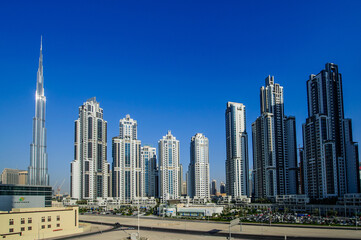 Fototapeta na wymiar DUBAI -MAY 11:Down town - group of buildings in Dubai down town, part of Business crossing project . 11 May 2017 , Dubai, UAE.
