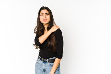 Young indian woman isolated on purple background having a shoulder pain.