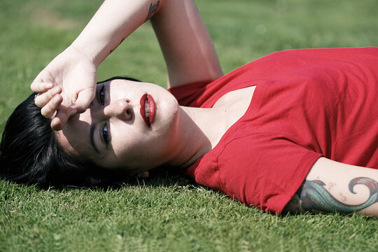 beautiful woman lying on the grass II