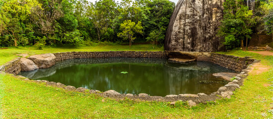 An octagonal lake in the gardens of the rock fortress of Sigiriya, Sri Lanka