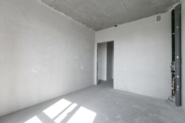 Obraz premium interior of the apartment without decoration in gray colors