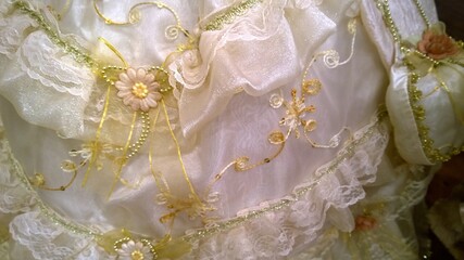 White wedding dress detail with vintage embroidery and lace. Romance fashion. Luxury design work....