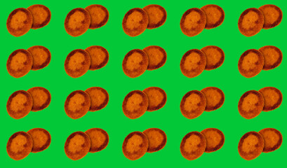 Pattern with two round Burger patties on a green background.