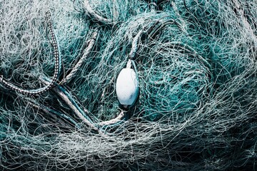 Fishermans nets and buoy tangled together