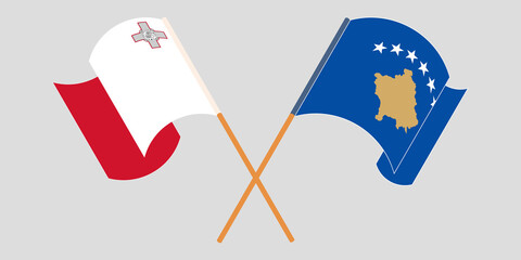 Crossed and waving flags of Kosovo and Malta