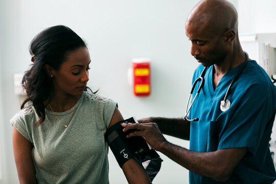 Exam: Woman Has Blood Pressure Tested