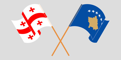 Crossed and waving flags of Kosovo and Georgia