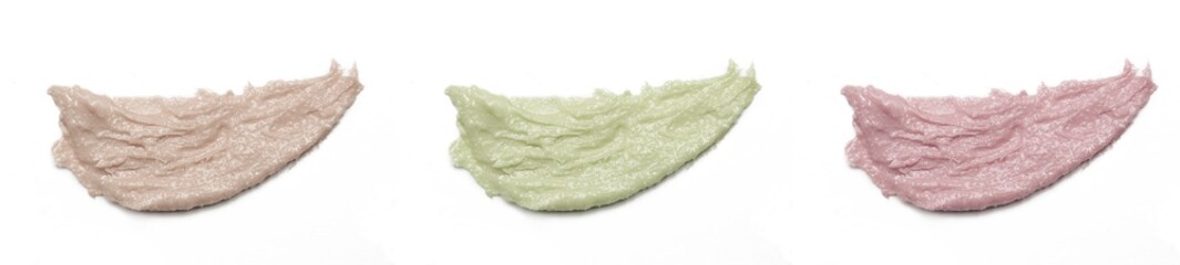 Cosmetics and makeup samples on white background