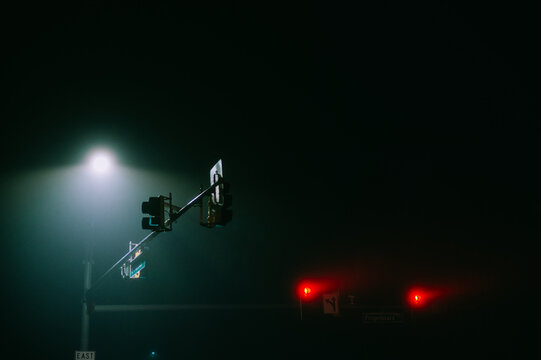 Isolated Traffic Lights In The Fog