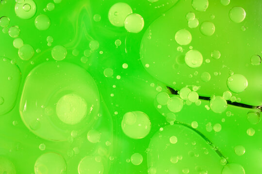 Swirling light green neon colors, looking like kiwi juice