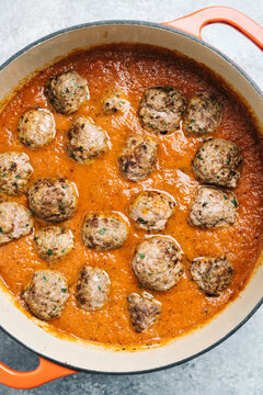 Meatballs added to fresh marinara sauce