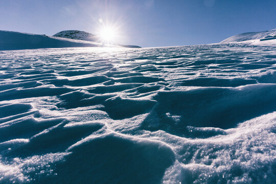 Climbing Steep Sunny Mountain Face