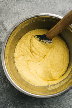 Mixing cornmeal for cornbread