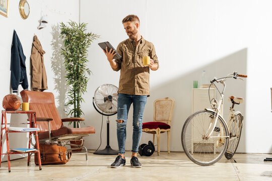 Man Reading News at Home