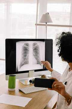 Telemedicine - Doctor Explaining Lung X-Ray