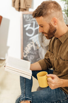 Man Reading for a Book Challenge