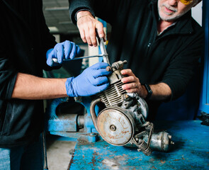 Two mechanics at work