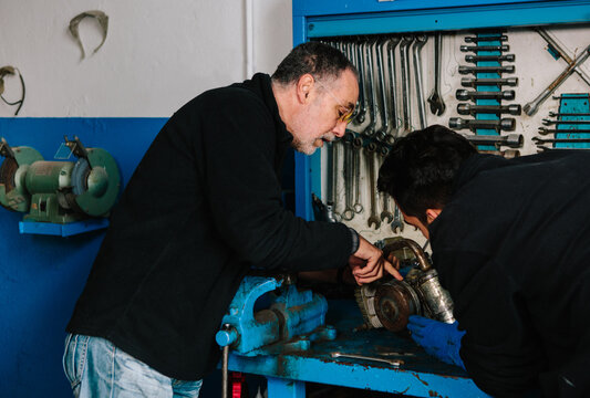 Two mechanics at work