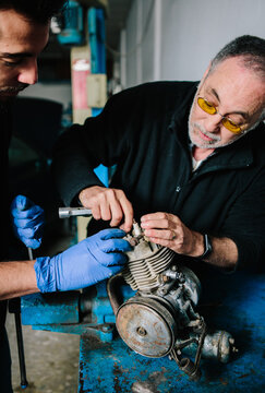 Two mechanics working