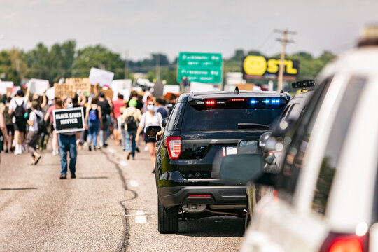 BLM: Police Vehicles Escort Peaceful Protestors On Highway