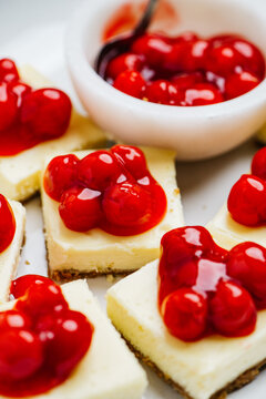 Cheesecake bars with cherry pie topping