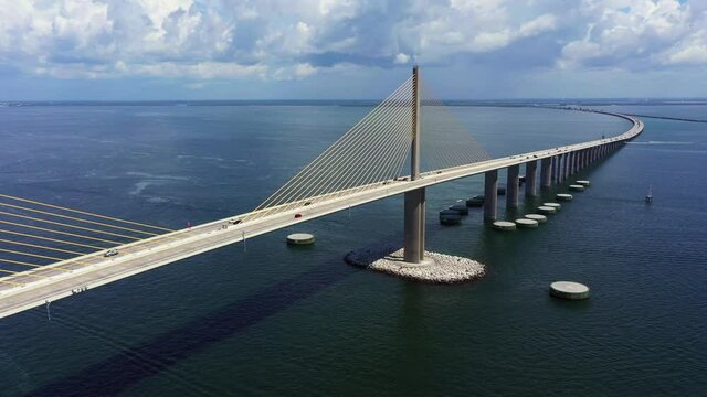 Aerial reveal of the Sunshine Skyway Bridge St Petersburg FL USA