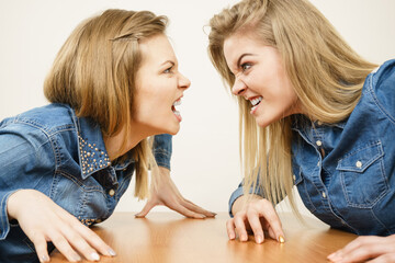 Two women having argue fight