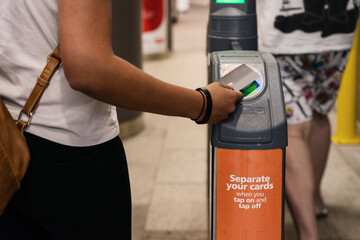 tapping on at the train station