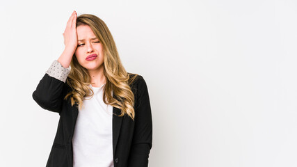 Young caucasian business woman isolated on white background Young caucasian bussines womantired and very sleepy keeping hand on head.