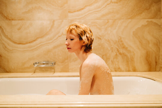 Woman With Short Hair In Bath