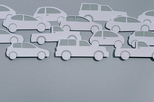 Paper car on grey background