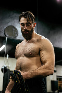 Handsome athlete gym training