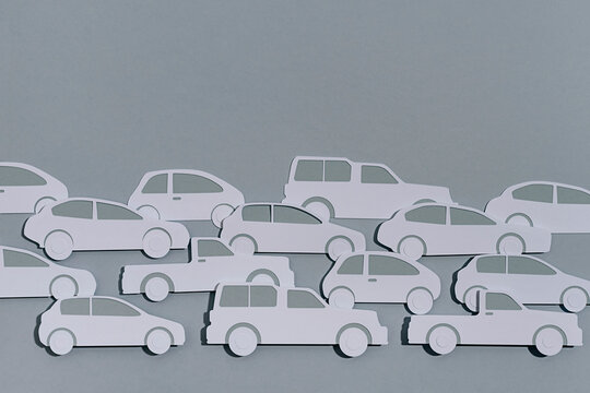 Paper car on grey background
