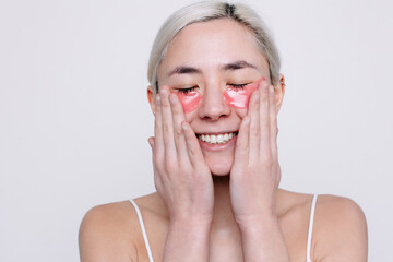 Studio portraits of pretty blonde asian woman