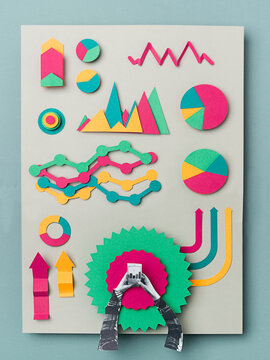 Female hands working with analytics on a mobile phone.