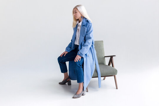 Studio portraits of pretty blonde asian woman