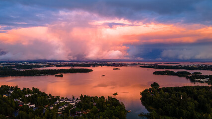 Fototapeta premium Gorgeous sunset is seen in Helsinki with the beautiful reflection on the Baltic Sea
